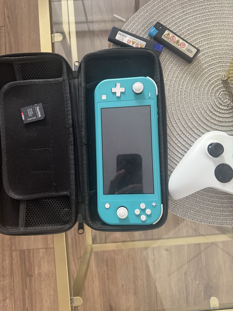 Nintendo switch lite + 2sd 64