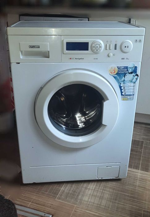 Стиральная машина Атлант 50У86, работает нормально