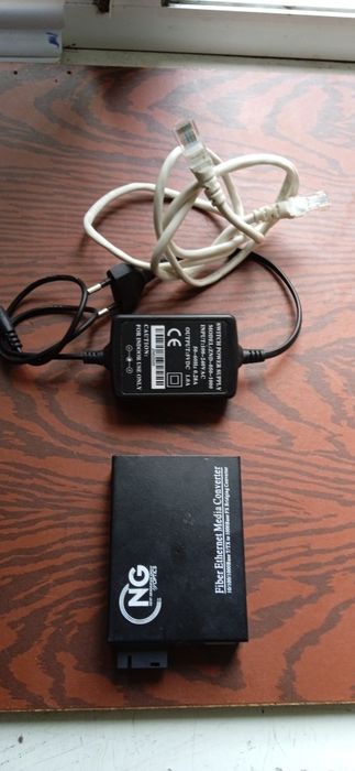 МедиаконвертерNG OPTICS950GS-//20A дешевле некуда налетай, чёрная пятн