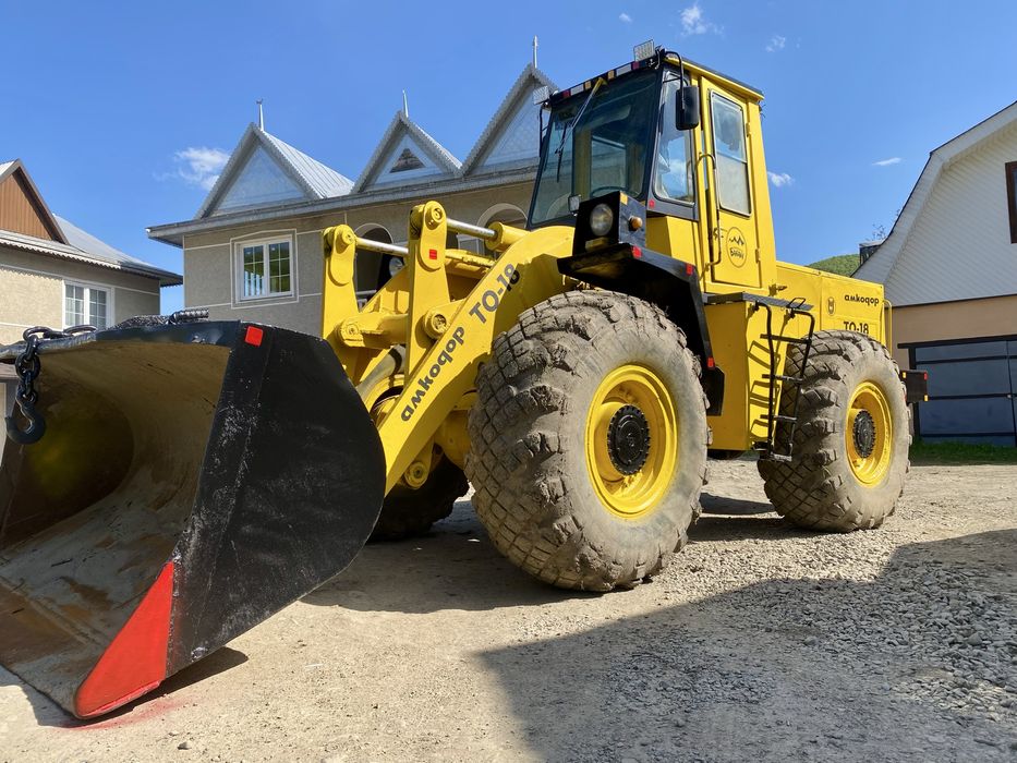 Амкадор ТО-18 навантажувач