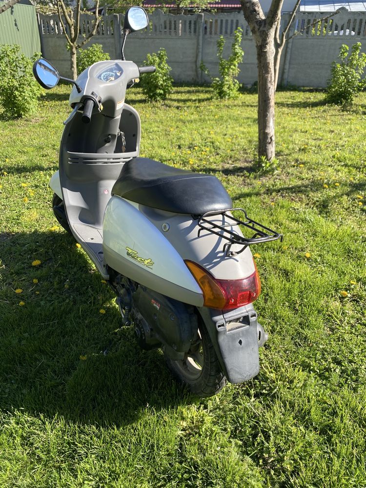 Скутер honda tact