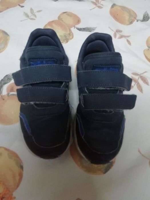 Adidas azuis riscas brancas
