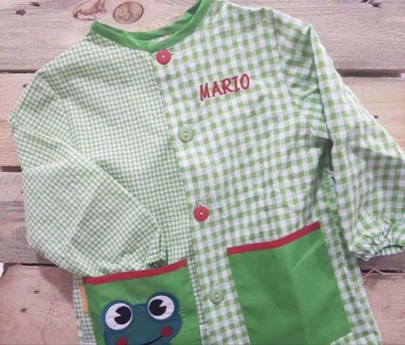 Bordar nome em bata escolar