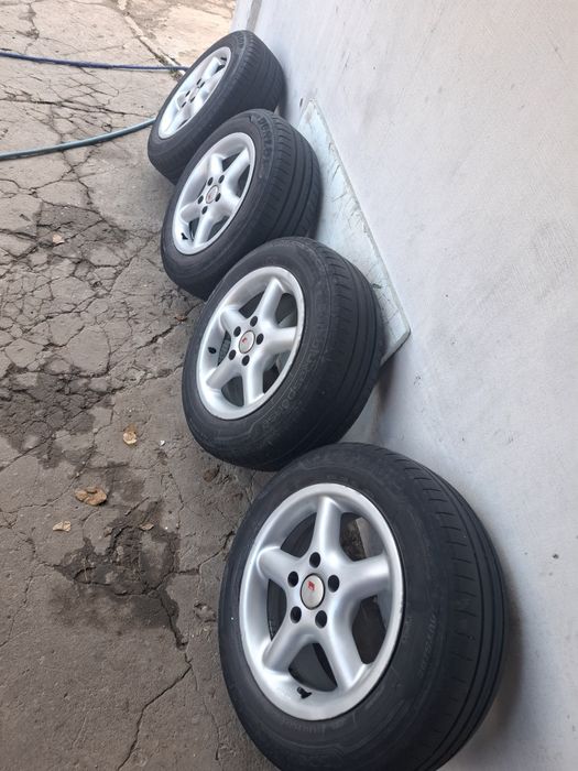 Диски шини ауді пасат гольф шкода титани r15 195/65