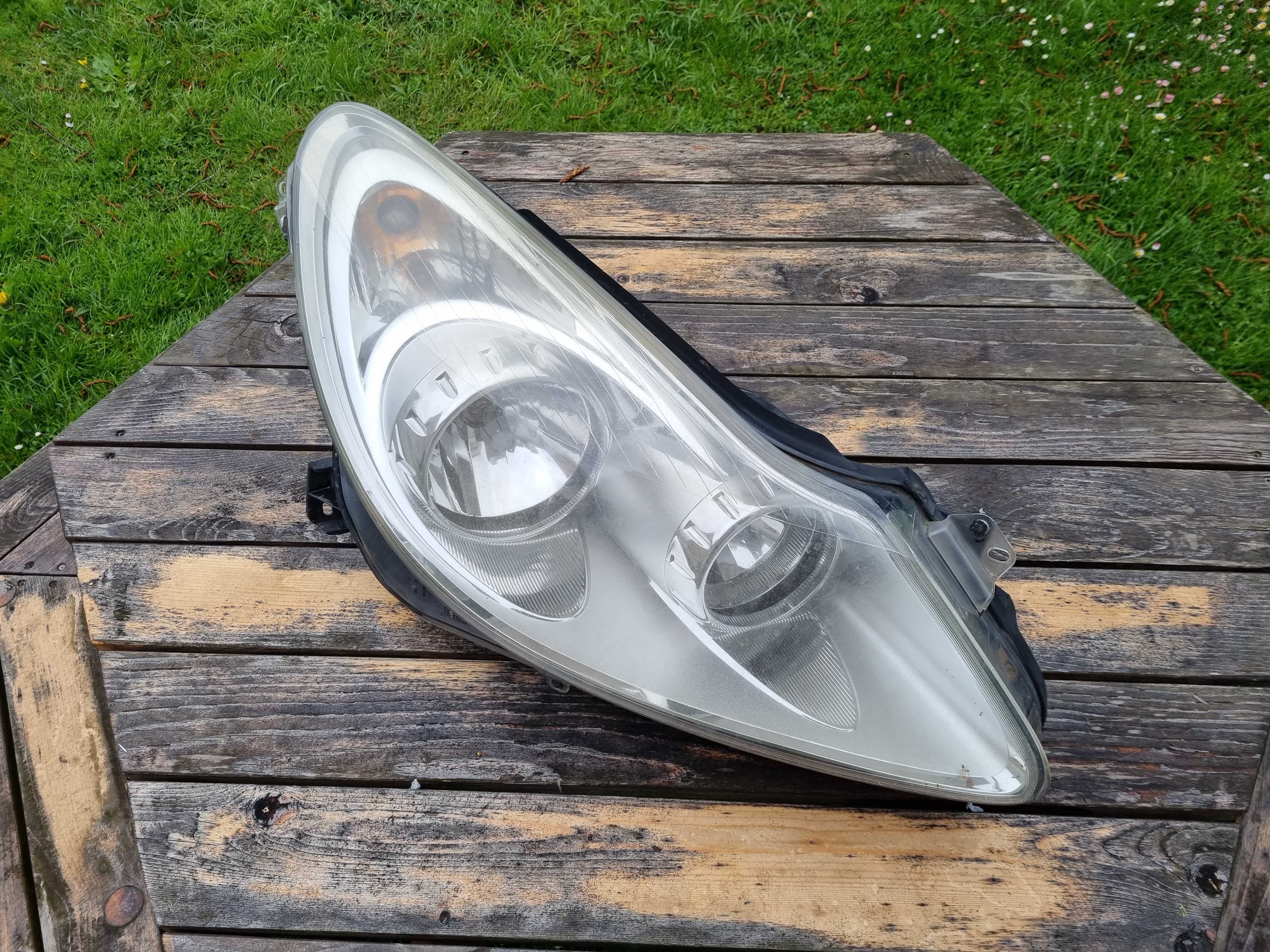 OPEL CORSA D przed LIFT (06-11)- LAMPA przednia przód PRAWA oryginał