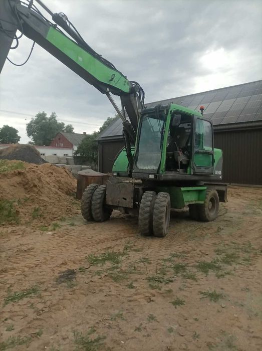 Koparka kołowa Volvo EW140B