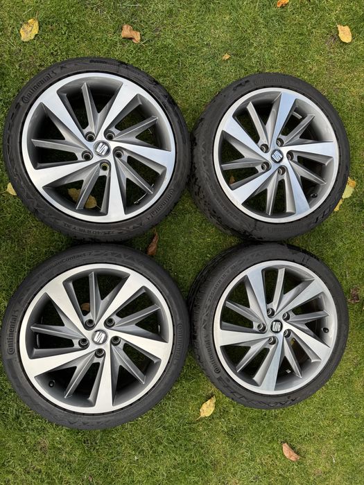Srebrne felgi 18” SEAT 5x112 oryginalne z oponami continental