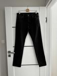 Spodnie jeansowe American Eagle Airflex+ czarne 33W34L