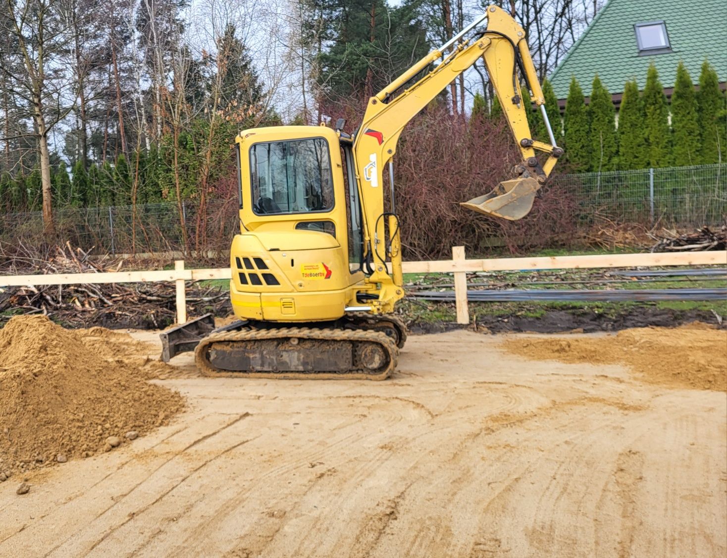 Koparka minikoparka wiertnica Warszawa Anin Wilanów Ursynów Piaseczno