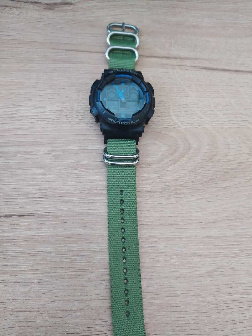 Oryginalny Casio G-SHOCK GA-100, pasek NATO