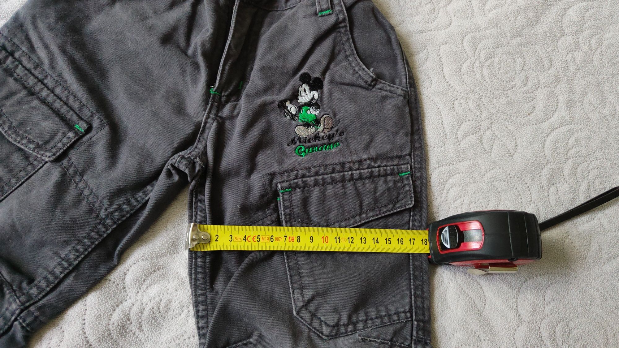 Spodnie chłopięce jeansowe Myszka Mickey firmy C&A r.104