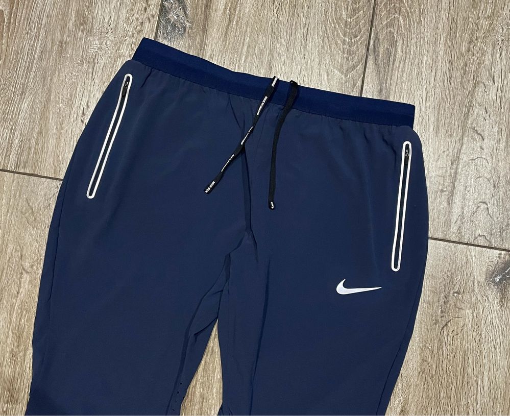 Meskie Spodnie biegowe Nike SWIFT SHIELD Obsidian Dri Fit r. L J. Nowe