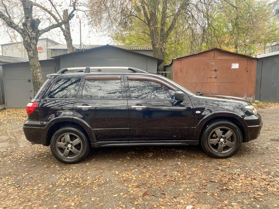 митсубиси Аутлендер 2.4 газ бензин автомат