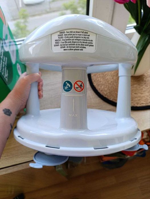 Поворотне дитяче сидіння в ванну