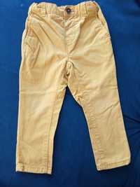 Musztardowe eleganckie spodnie Reserved r. 86