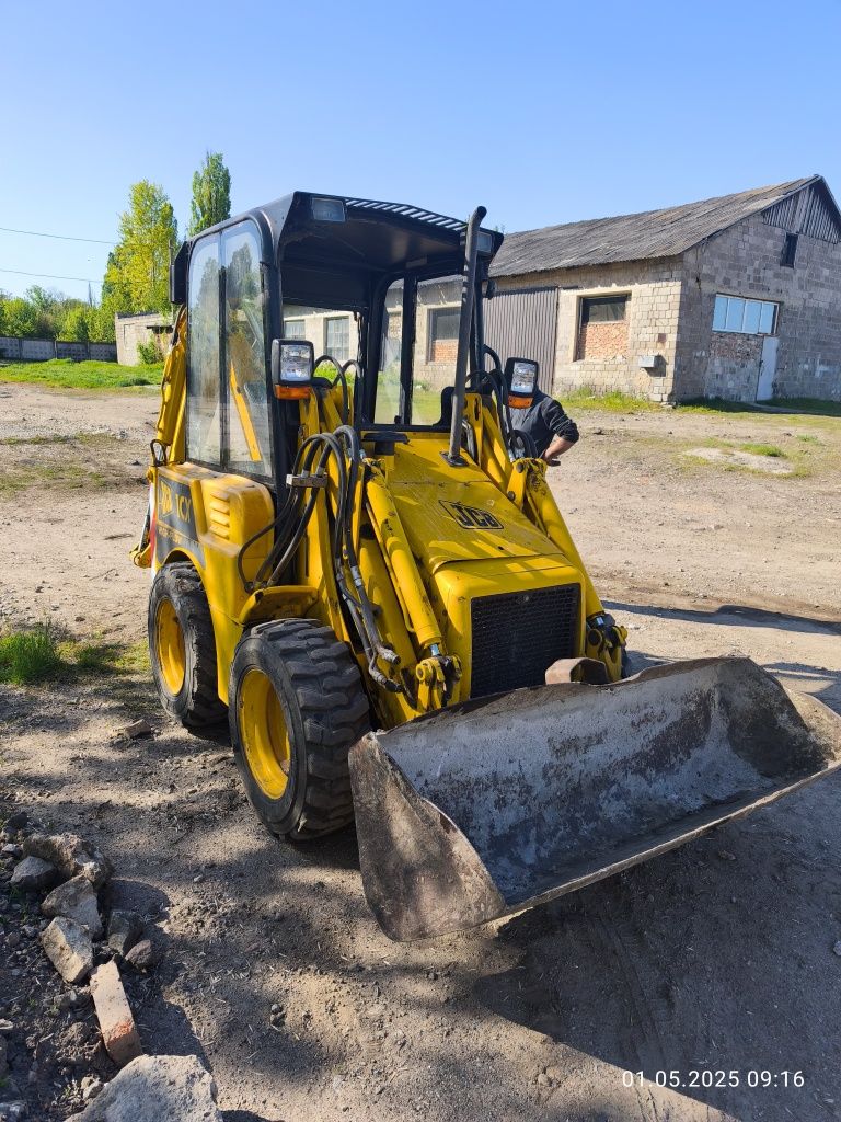 Минимогрузчик экскаватор JCB 1 cx