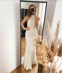 Piękna suknia ślubna ASOS EDITION model Ottilie z trenem dekolt halter