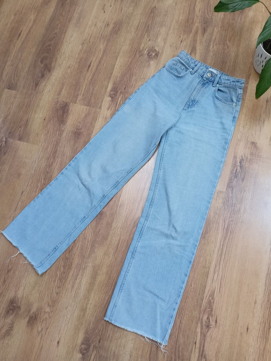 Nowe jasne niebieskie spodnie z wysokim stanem jeansy wide leg proste