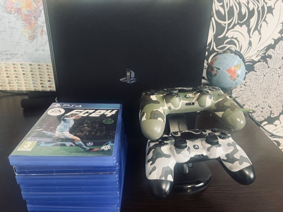 PlayStation 4 Pro 1TB + 2 джойстики + 5 ігор