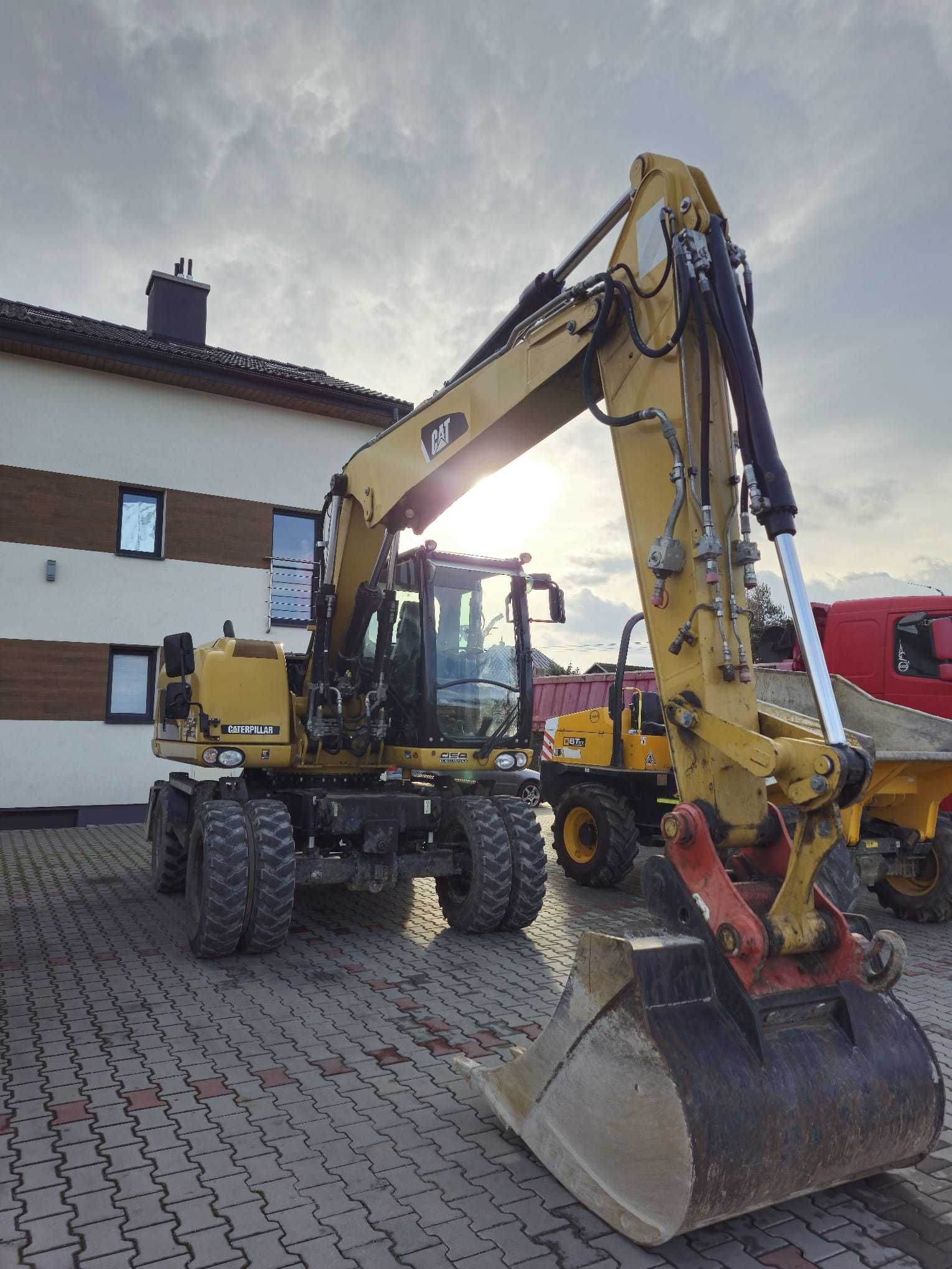KOPARKA KOŁOWA marki CAT TYP M313D  150zł/h