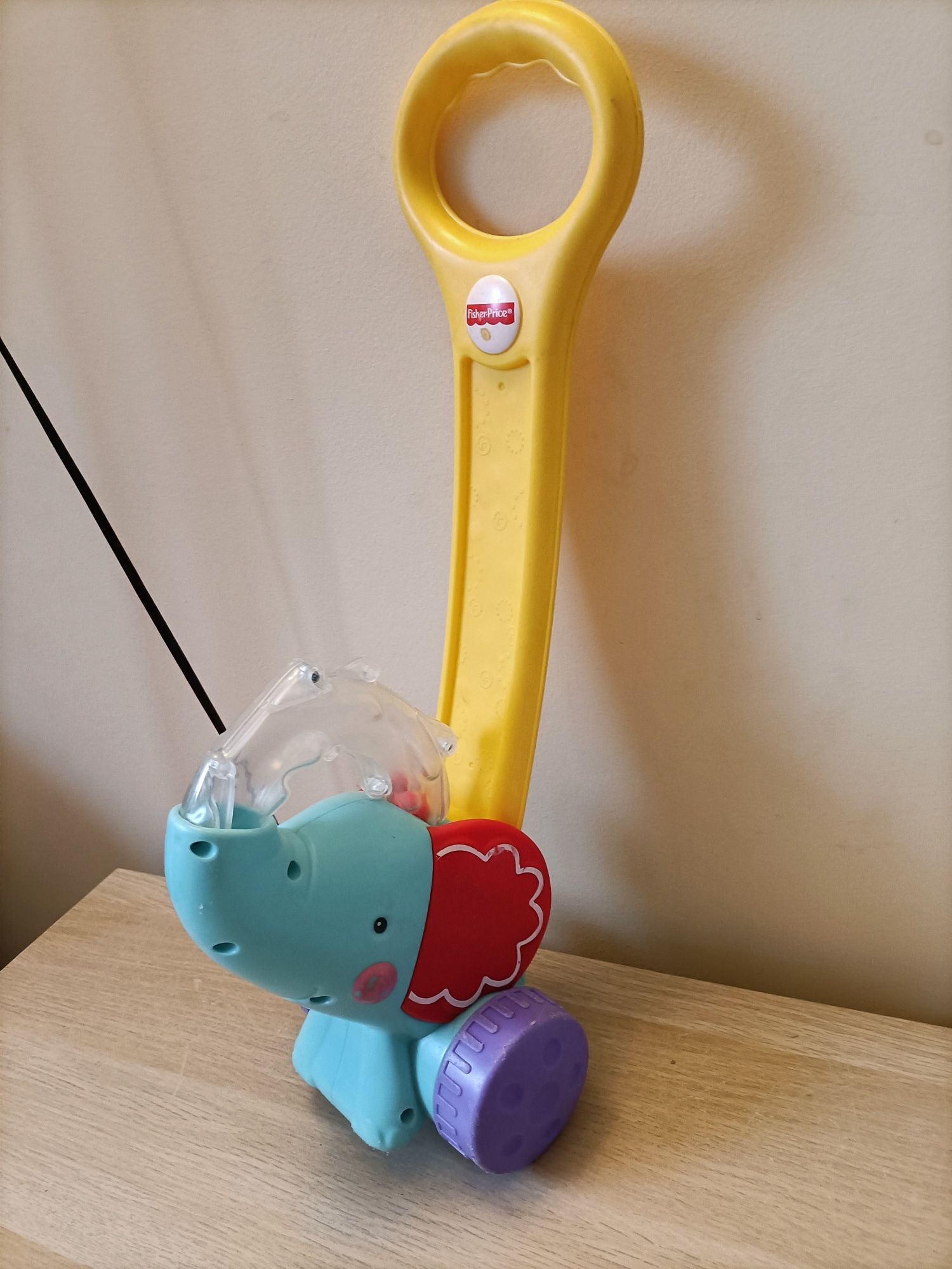 Fisher Price zabawka słoń słonik pchacz z kuleczkami