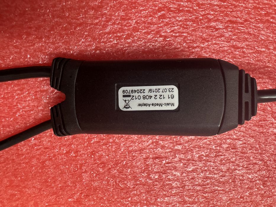 Adaptador audio Bmw / Mini original para Iphone