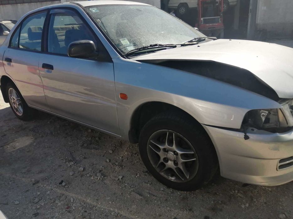 Para peças Mitsubishi Lancer VI 1.3 12V ano 1999