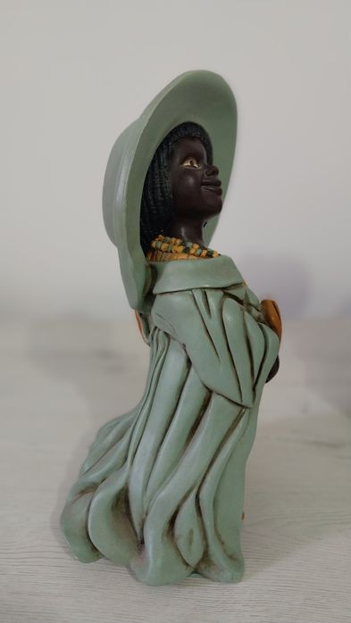 Casal de africanos pintados à mão