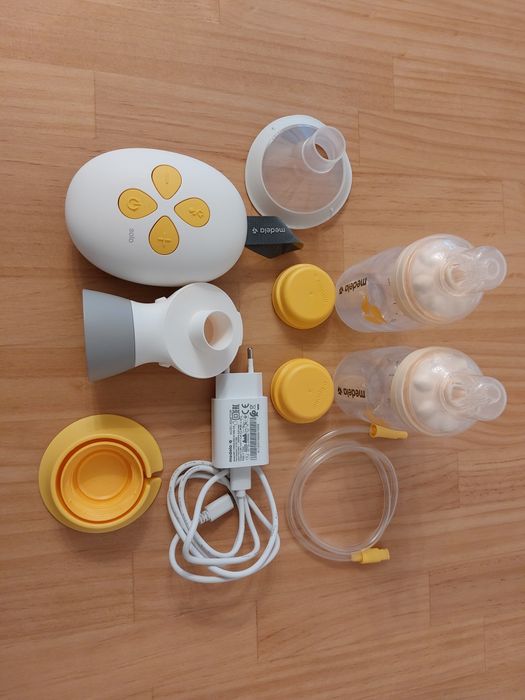 Bomba eléctrica e 2 biberons Medela
