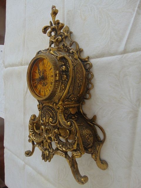 Relógio em bronze