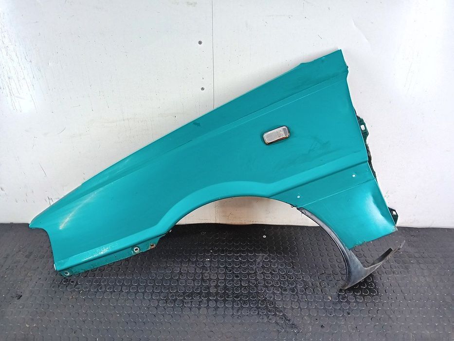 BŁOTNIK LEWY PRZÓD FSO POLONEZ CARO L69 HATCHBACK