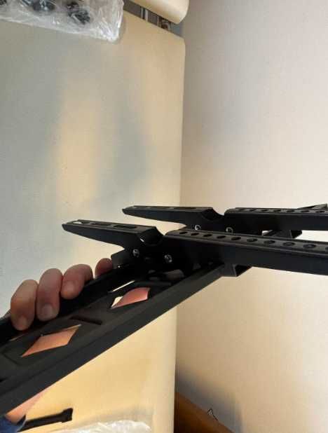 Кріплення для телевізора на стіну