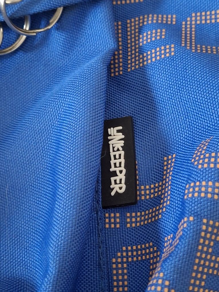 Mochila Unkeeper Tons de azul nova