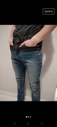Dwukolorowe jeansy