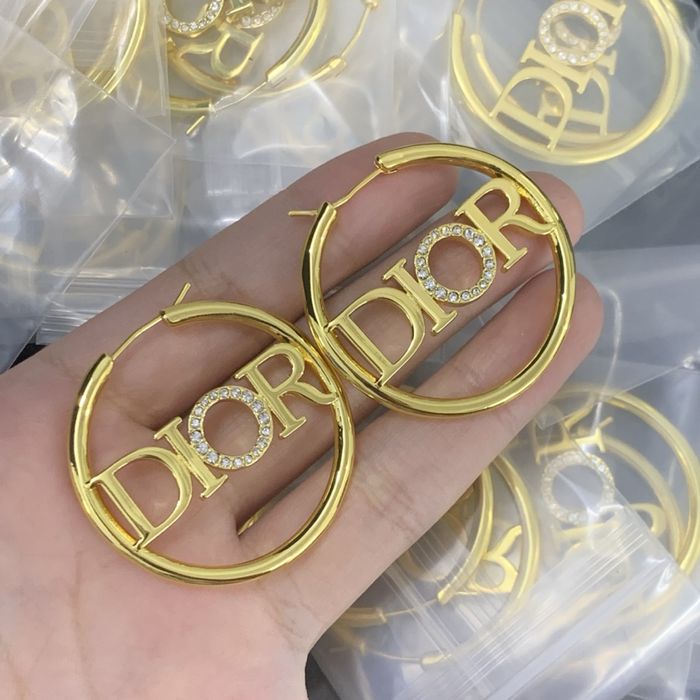 Nowe kolczyki Christian Dior CD stal nierdzewna