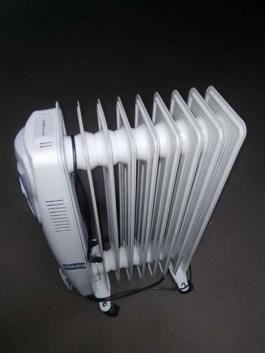 Продам Обогреватель масляный