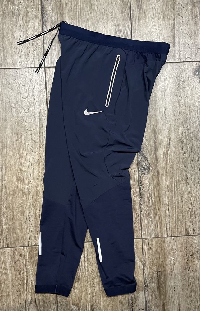 Meskie Spodnie biegowe Nike SWIFT SHIELD Obsidian Dri Fit r. L J. Nowe