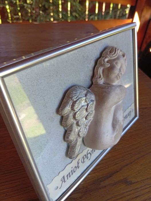 Anioł płynności finansowej na ścianę