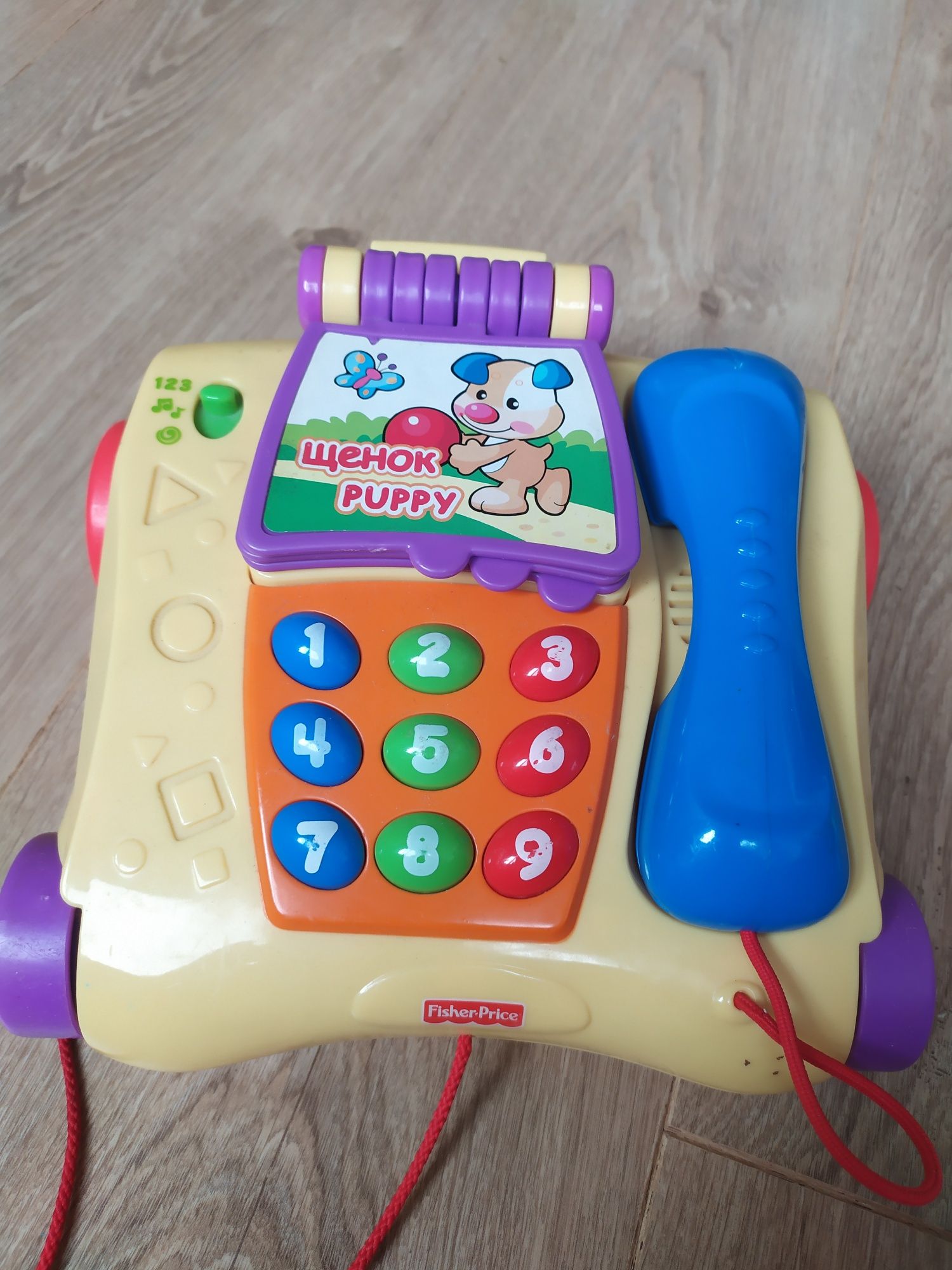 Продам телефон каталку Fisher Price