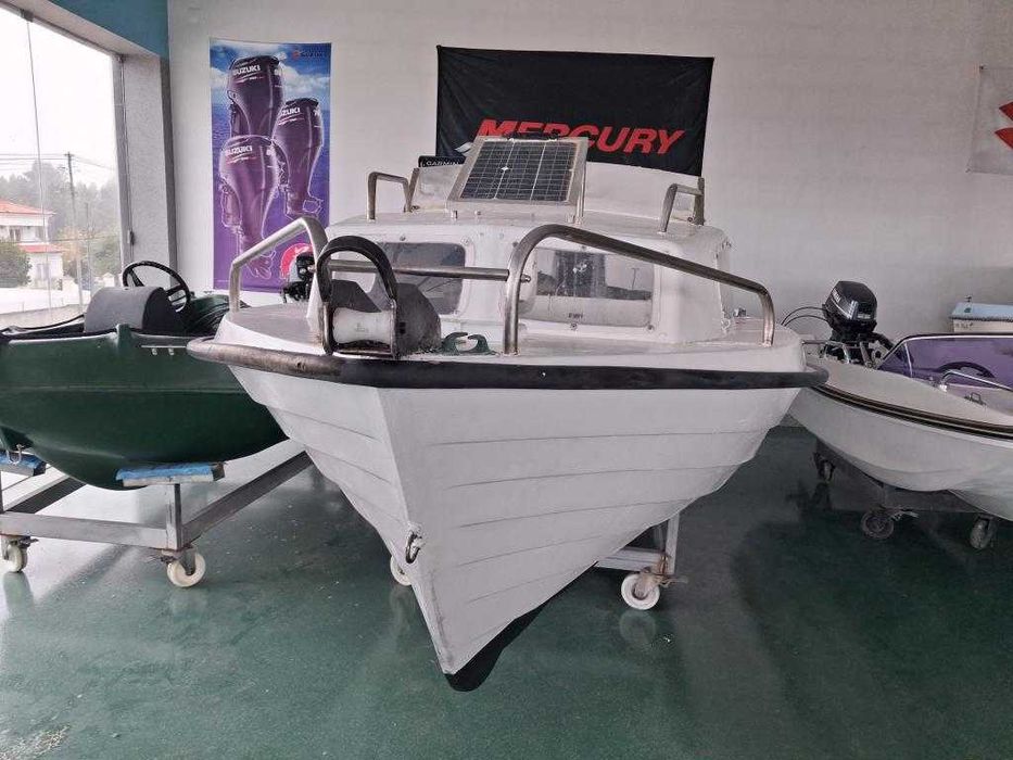 Barco OBE 4.70 com o motor TOHATSU 25HP  com trime 4T.