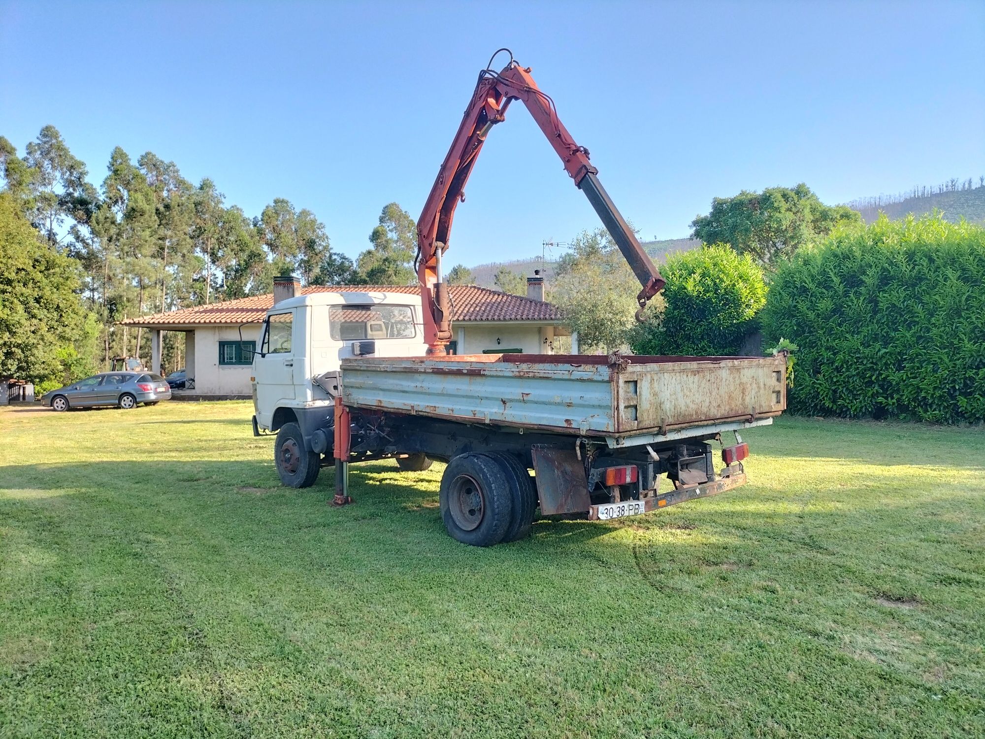 Camião Man com grua, basculante