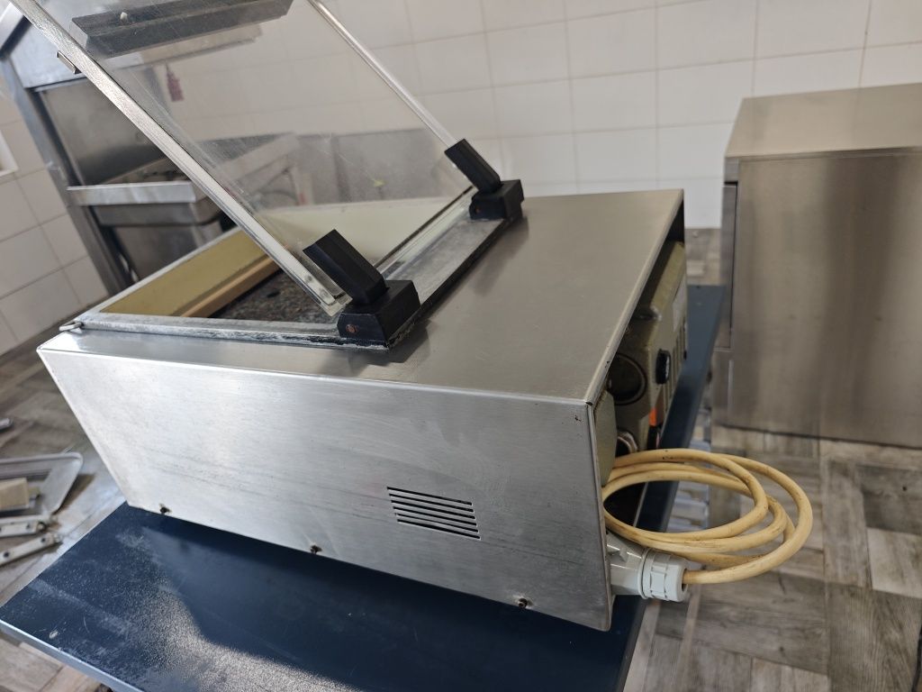 Вакуумний пакувальних вакууматор Weco-matic
