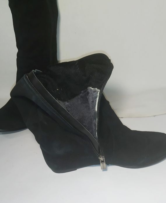 Высокие зимние сапоги