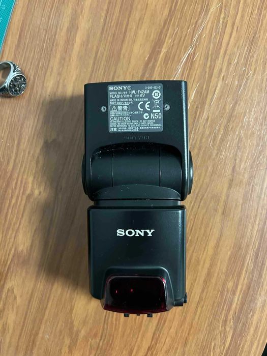 Lampa błyskowa Sony HVL-F42AM + Adapter na nowe body (Gratis!)