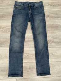 Męskie spodnie jeansowe Calvin Klein. Rozm. 32/32