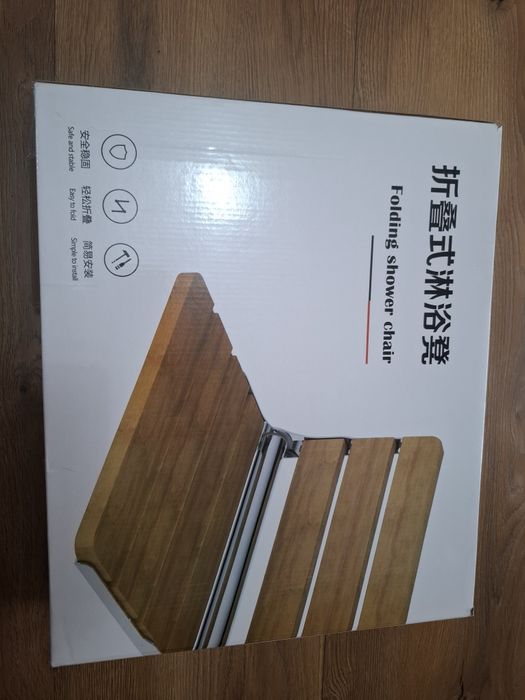 składane siedzisko prysznicowe, które można przymocować do ściany