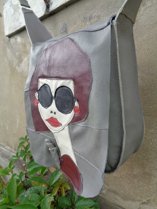 Artystyczna torebka skórzana z głową kobiety. Handmade