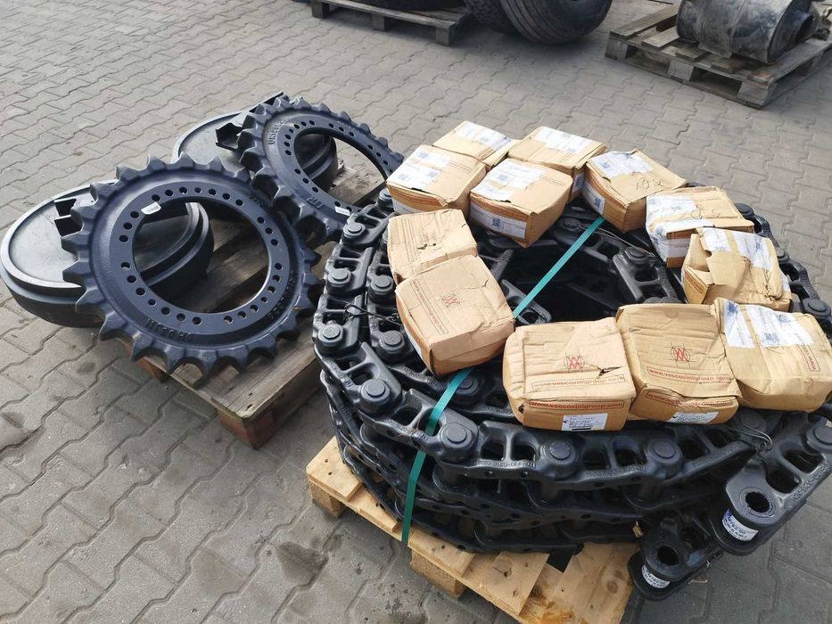 Nowe łańcuchy gąsienicy z śrubami, koła napinające, gwiazdy LIEBHERR