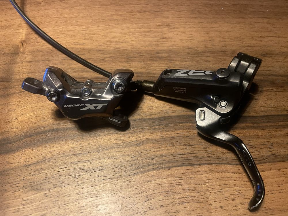 Hamulec shimano xt br-m8120 i zee bl-m640