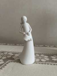 Porcelanowa figurka dziewczynki z konewka, minimalistyczna